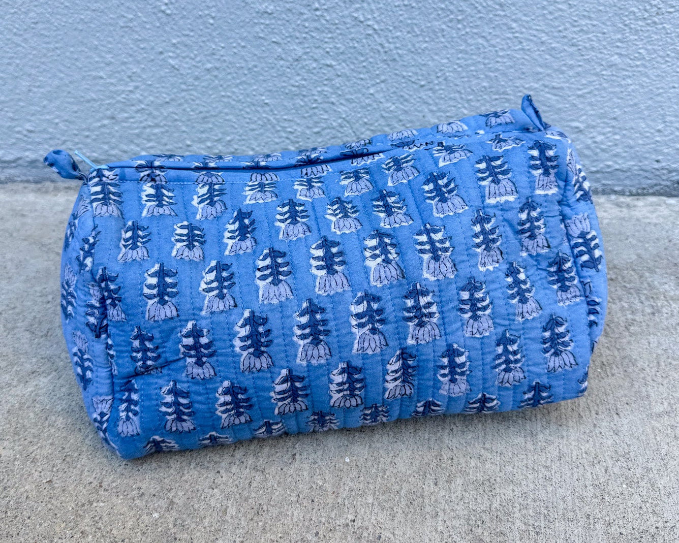 blue quilted block print cosmetic makeup bag