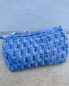 blue quilted block print cosmetic makeup bag