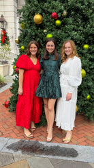 Shimmer crinkled long sleeve tiered midi dress with V-neckline, stand collar, waist tie belt, and flowing skirt.