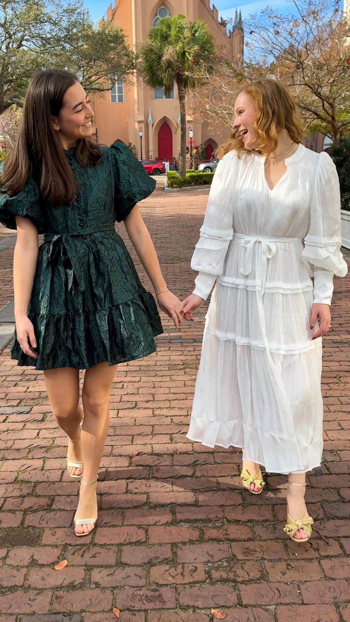 Shimmer crinkled long sleeve tiered midi dress with V-neckline, stand collar, waist tie belt, and flowing skirt.