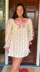 Cream rose stripe floral mini dress with pink scalloped lace collar and ribbon tie.