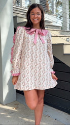 Cream rose stripe floral mini dress with pink scalloped lace collar and ribbon tie.