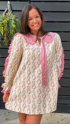Cream rose stripe floral mini dress with pink scalloped lace collar and ribbon tie.