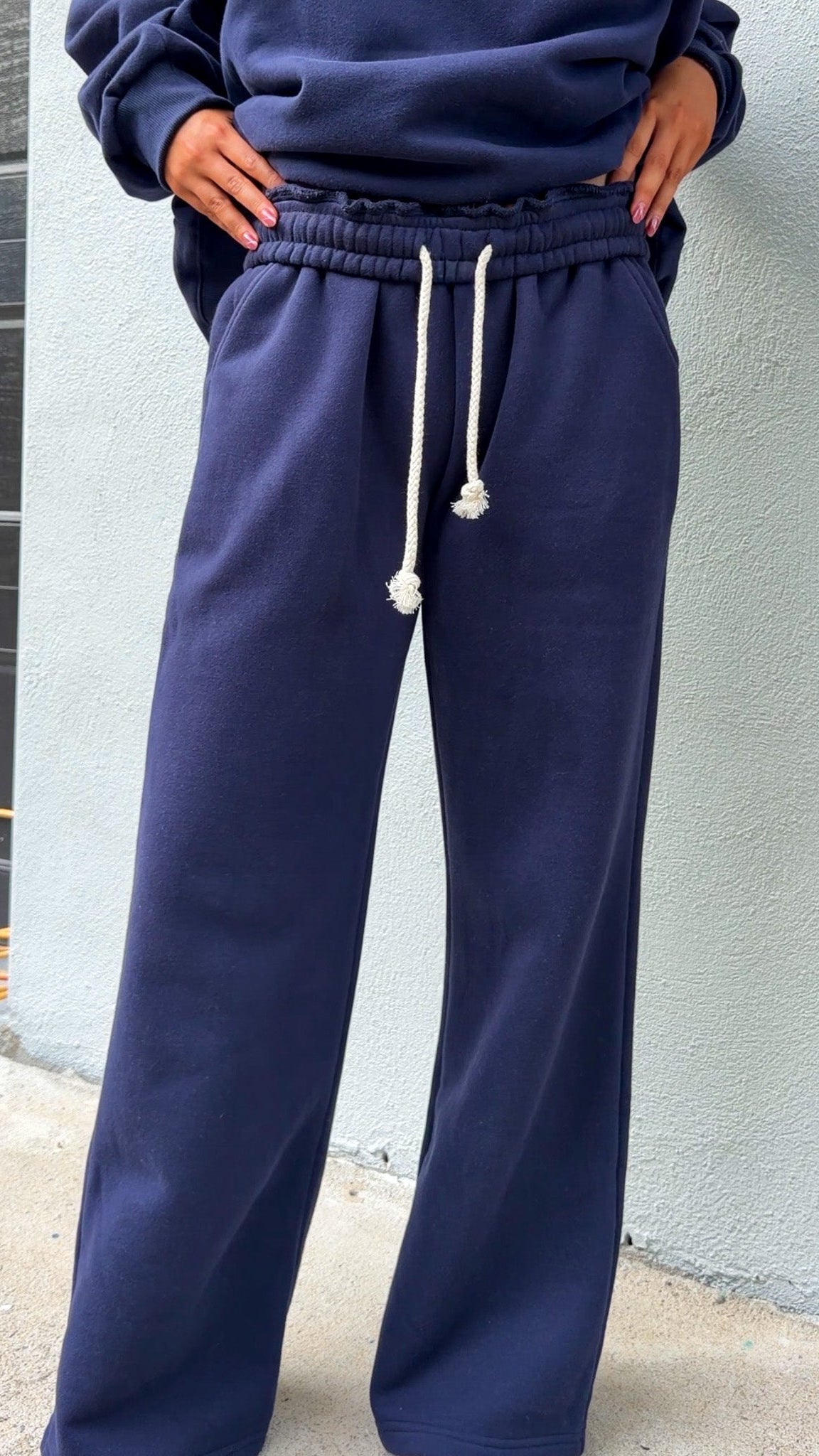 navy wide leg sweatpants with stretch waist and drawstring