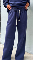 navy wide leg sweatpants with stretch waist and drawstring