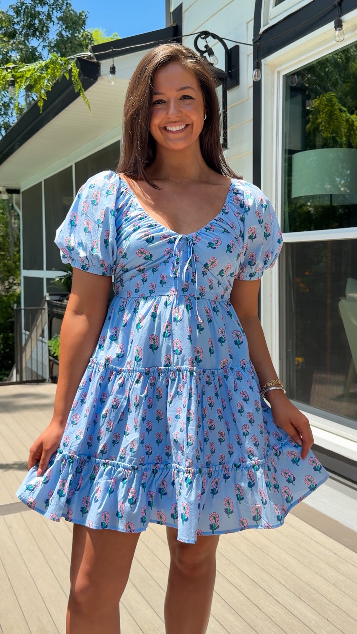 women's mini dress in blue floral puff sleeves