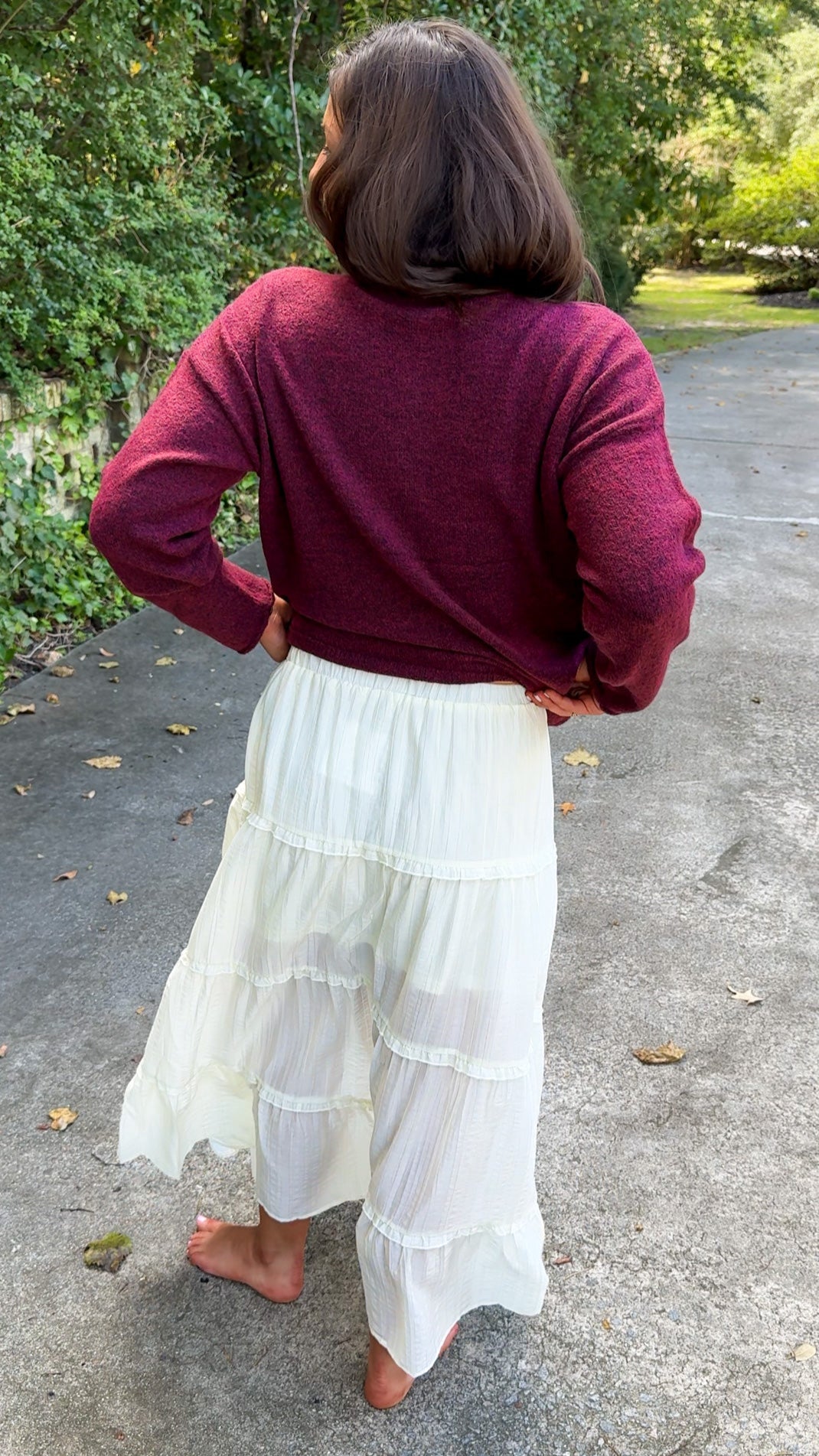 maroon sweater and ivory cream ruffle maxi skirt back view