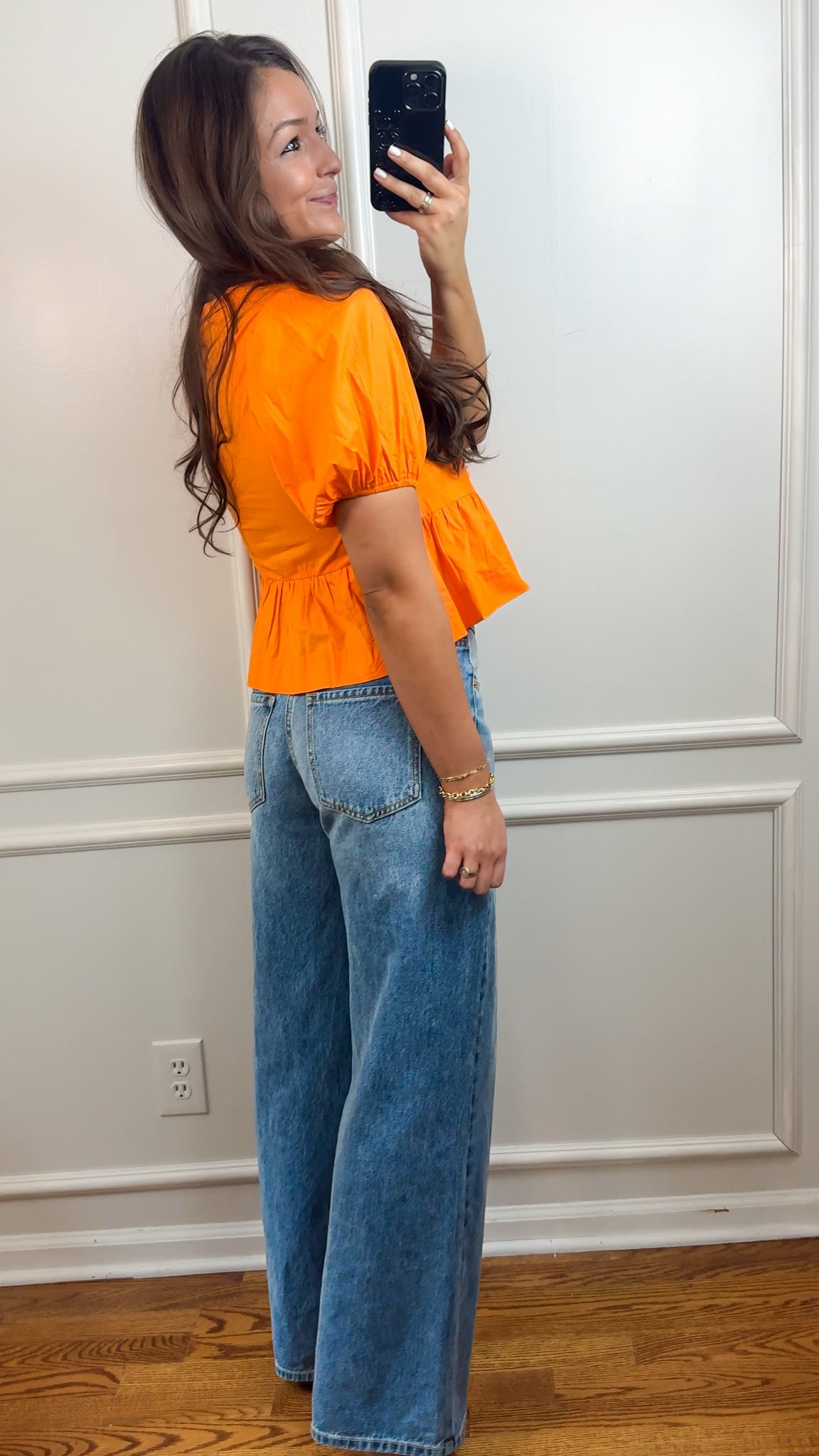 back view orange tie top blouse with puff sleeves