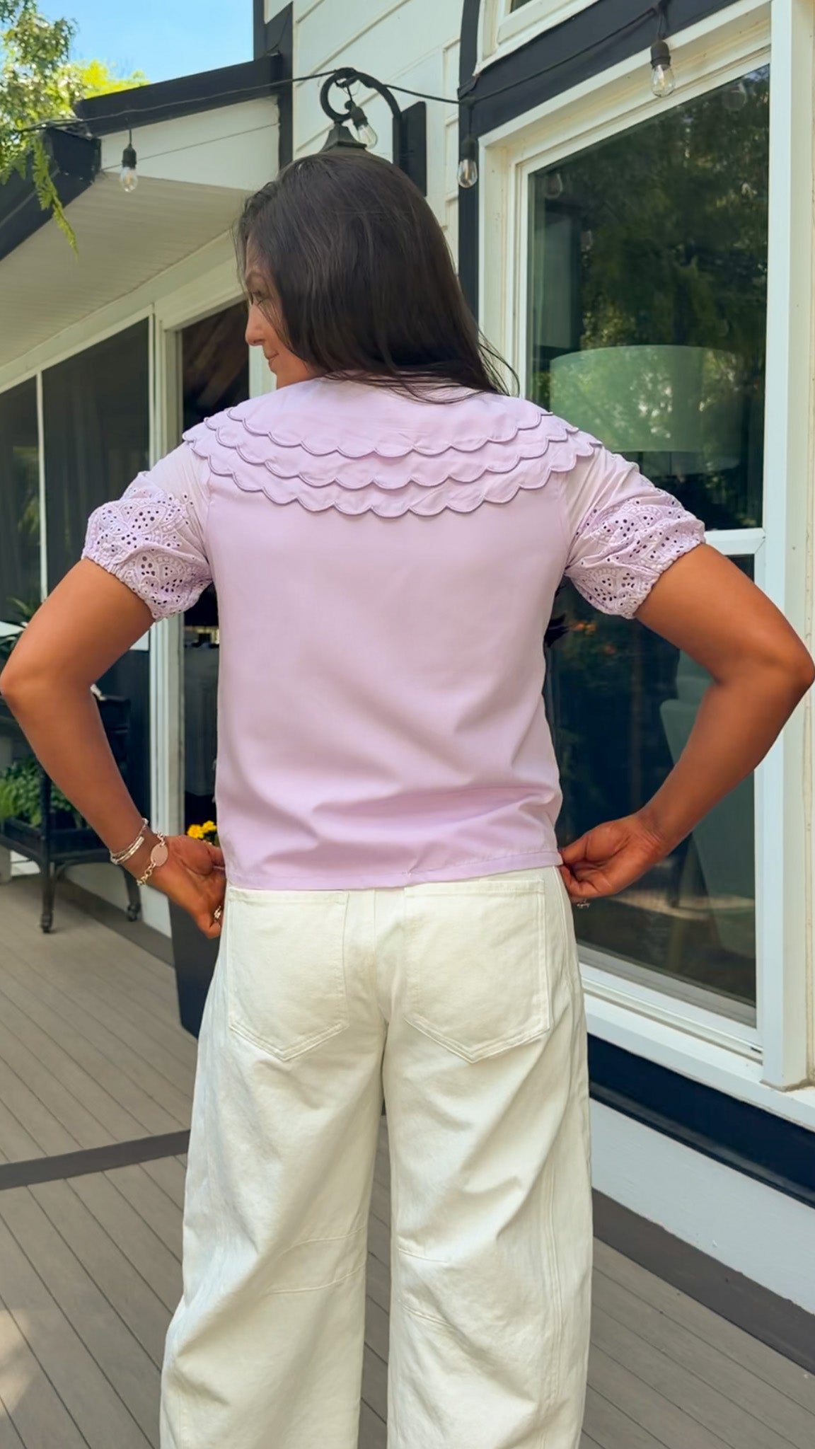 lilac top with eyelet puff sleeves and oversized collar button down closure