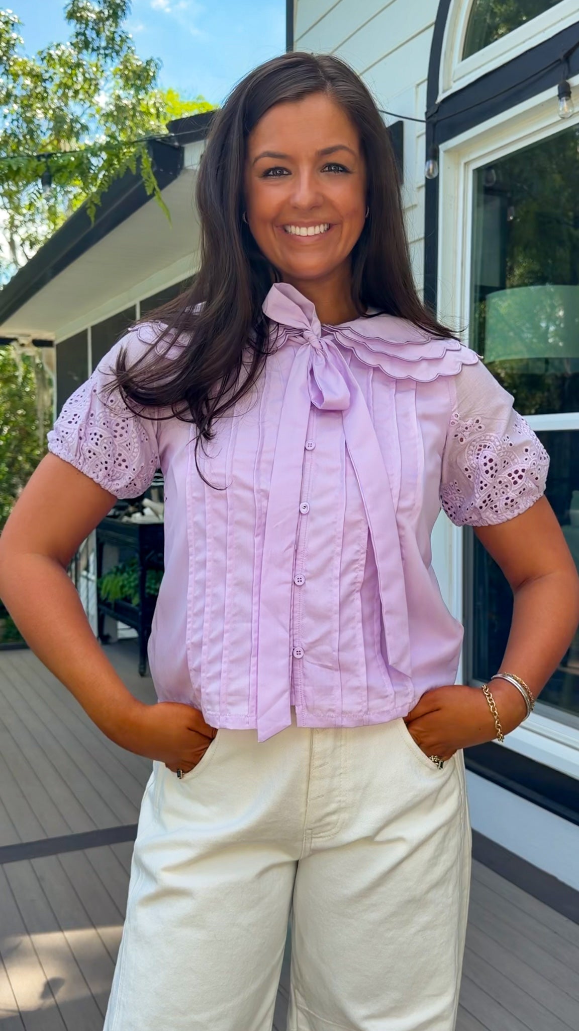 lilac top with eyelet puff sleeves and oversized collar button down closure