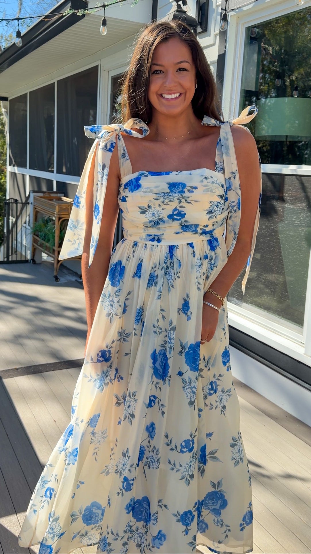 women's floral blue cream midi dress with smocked detailing and tie straps flowy