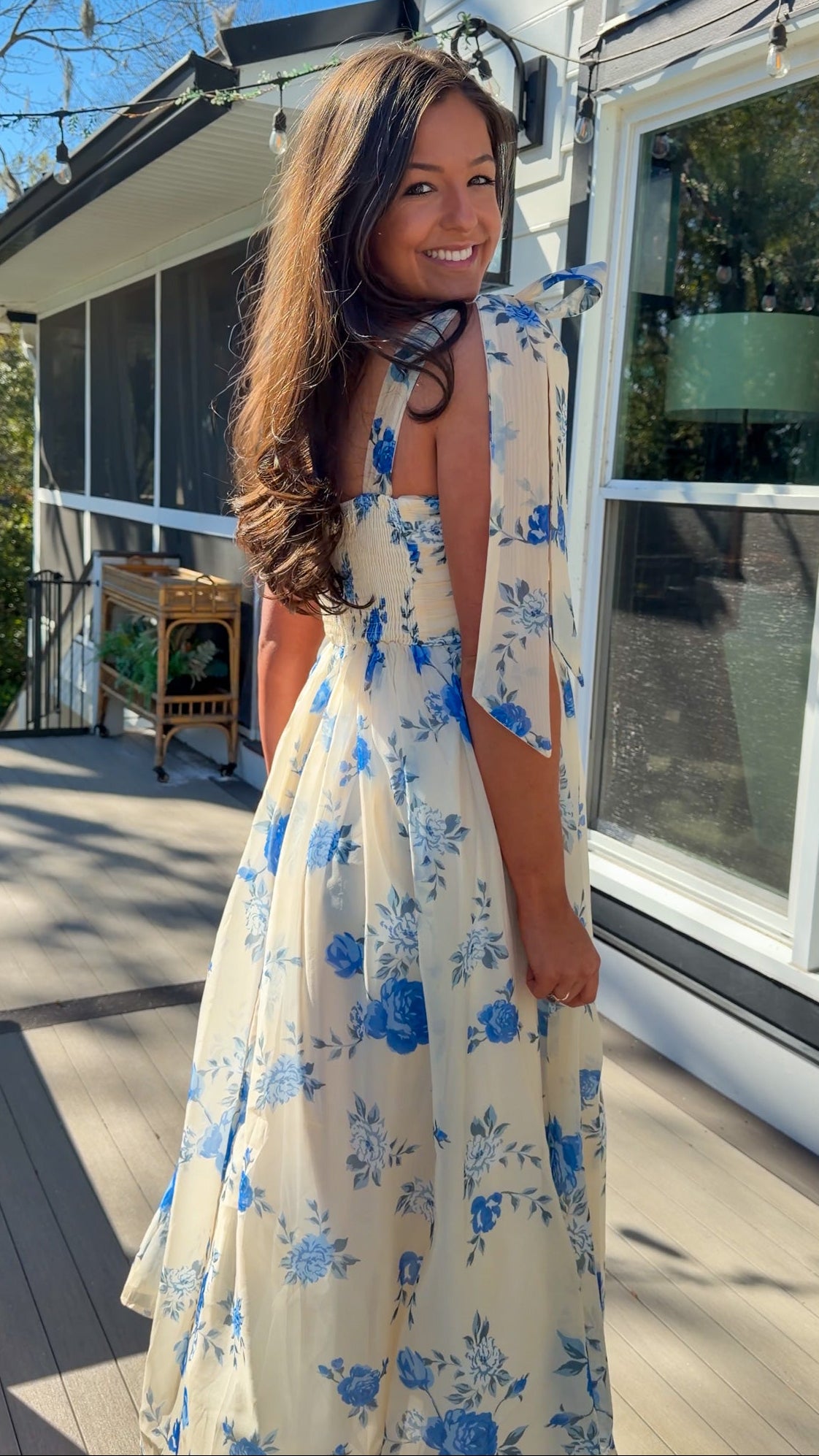 women's floral blue cream midi dress with smocked detailing and tie straps flowy