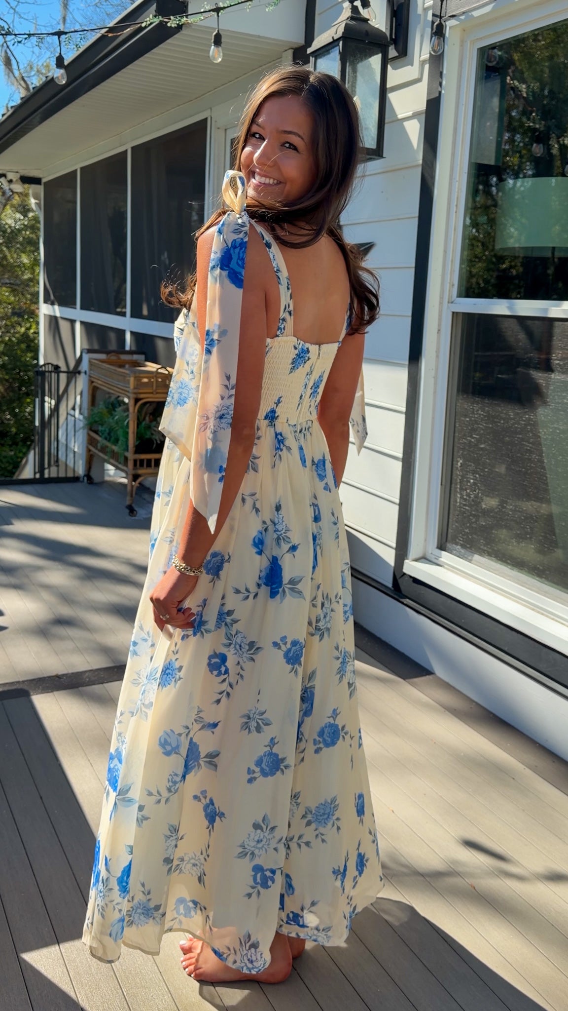 women's floral blue cream midi dress with smocked detailing and tie straps flowy