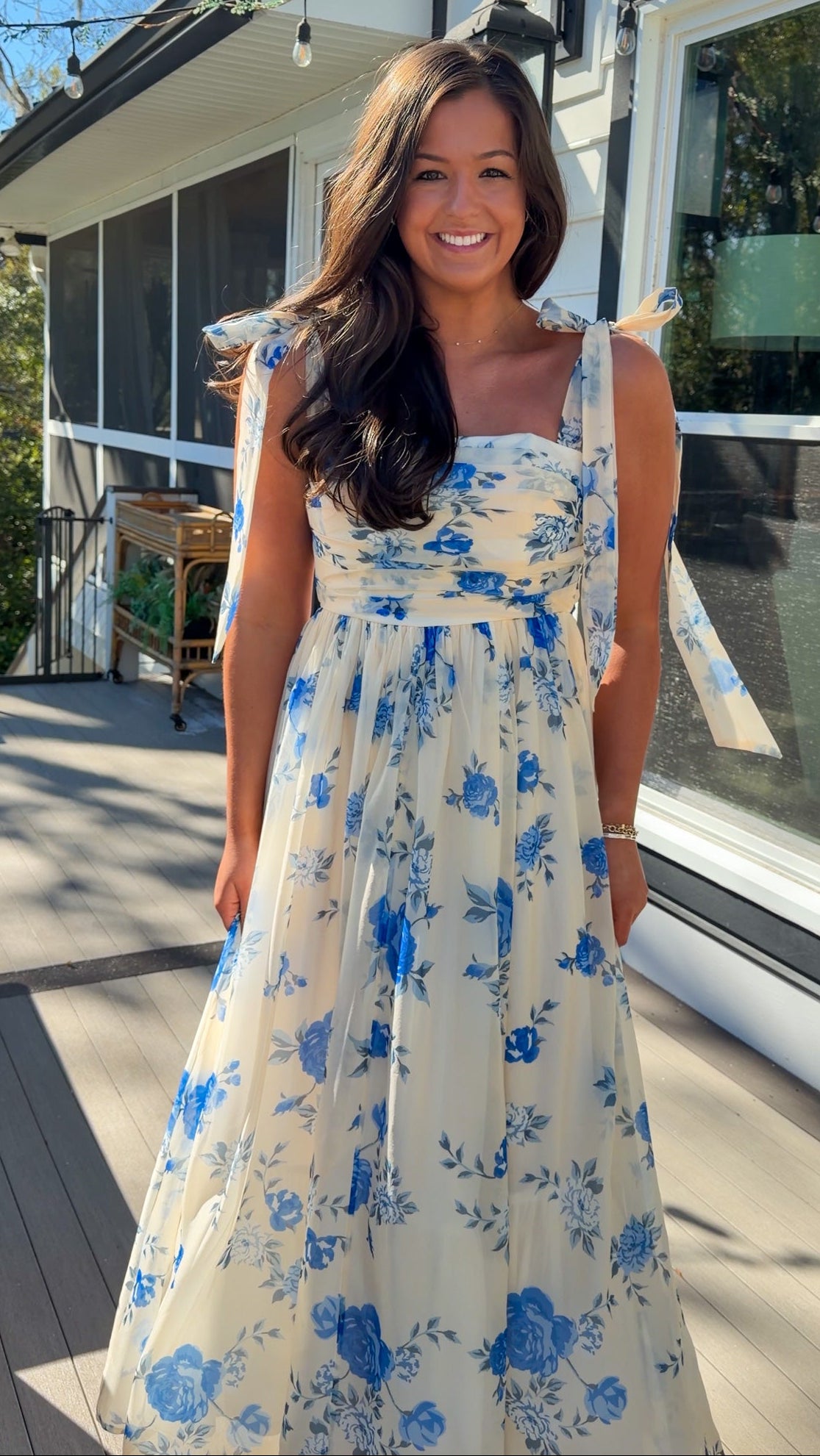 women's floral blue cream midi dress with smocked detailing and tie straps flowy