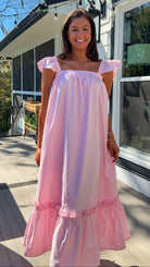 baby pink midi dress with flutter sleeves and tiered ruffle hem