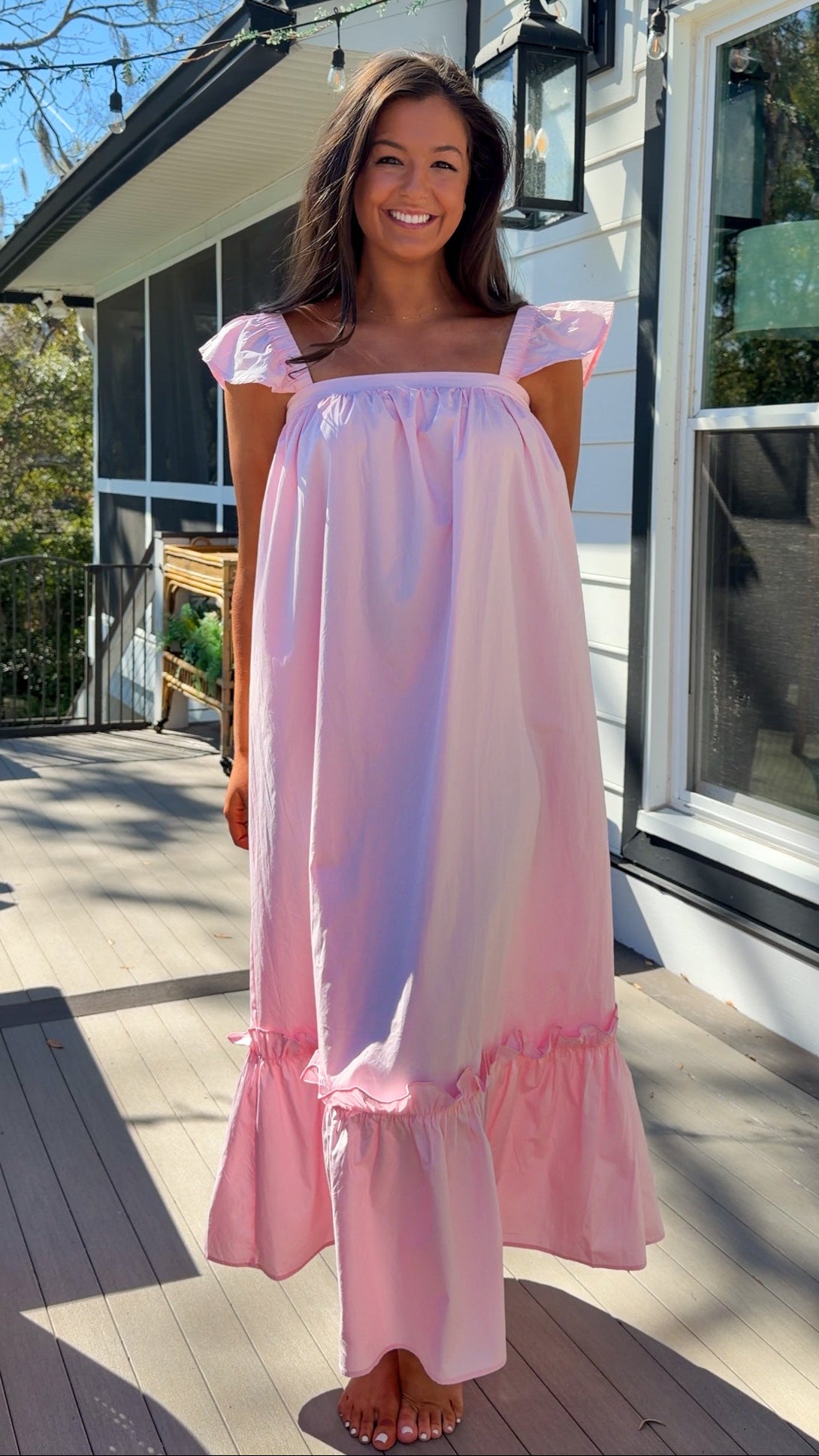 baby pink midi dress with flutter sleeves and tiered ruffle hem