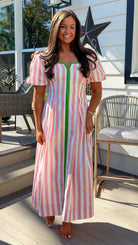 pink striped midi dress with green contrast trim and puff sleeves