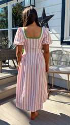 pink striped midi dress with green contrast trim and puff sleeves