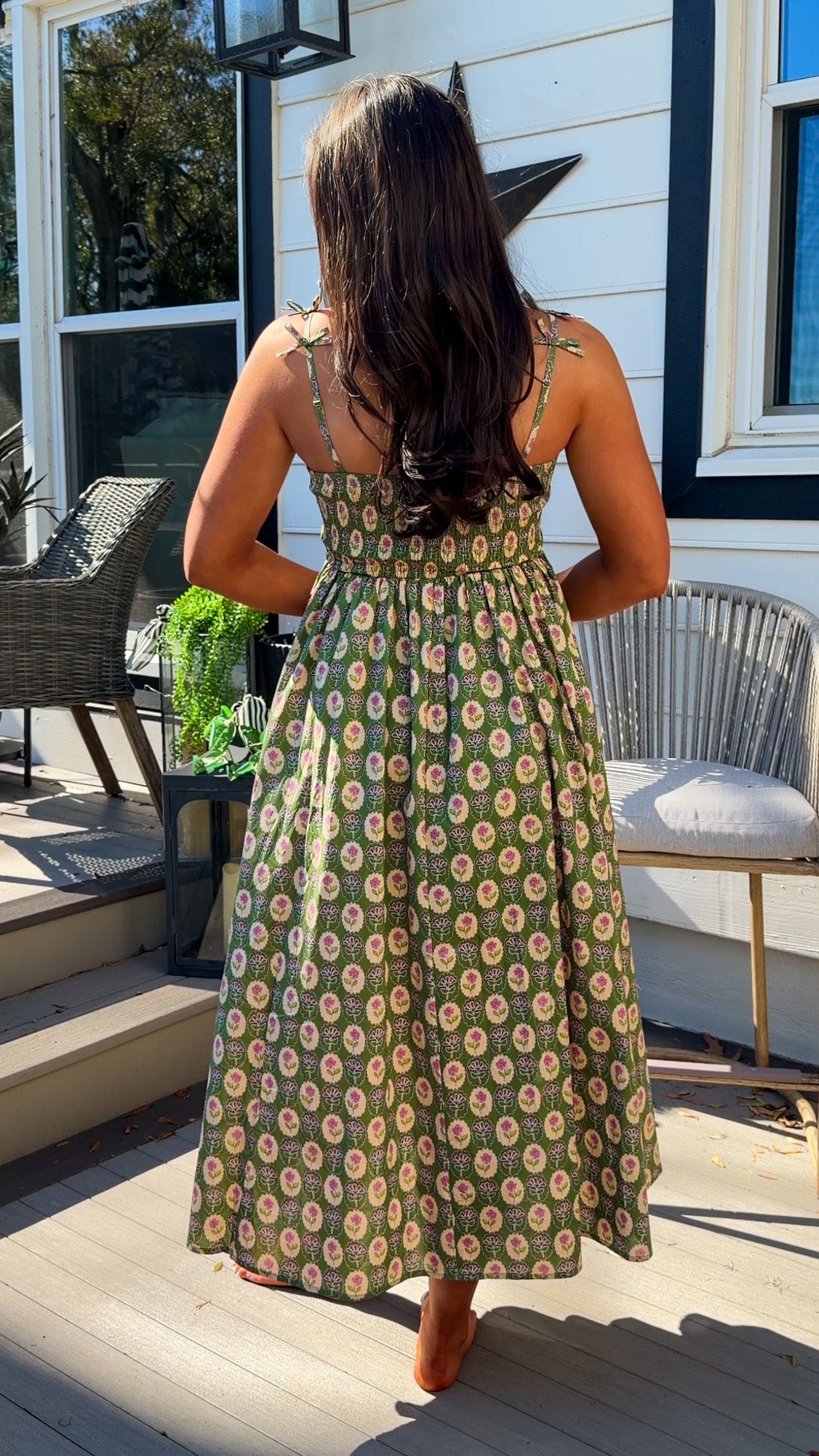 green floral sweetheart neckline midi dress with bow straps and chest cutout