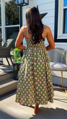 green floral sweetheart neckline midi dress with bow straps and chest cutout