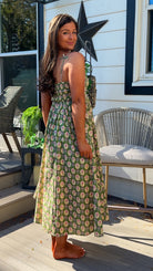 green floral sweetheart neckline midi dress with bow straps and chest cutout