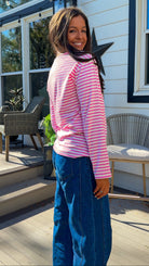 pink and white striped long sleeve knit top with relaxed fit