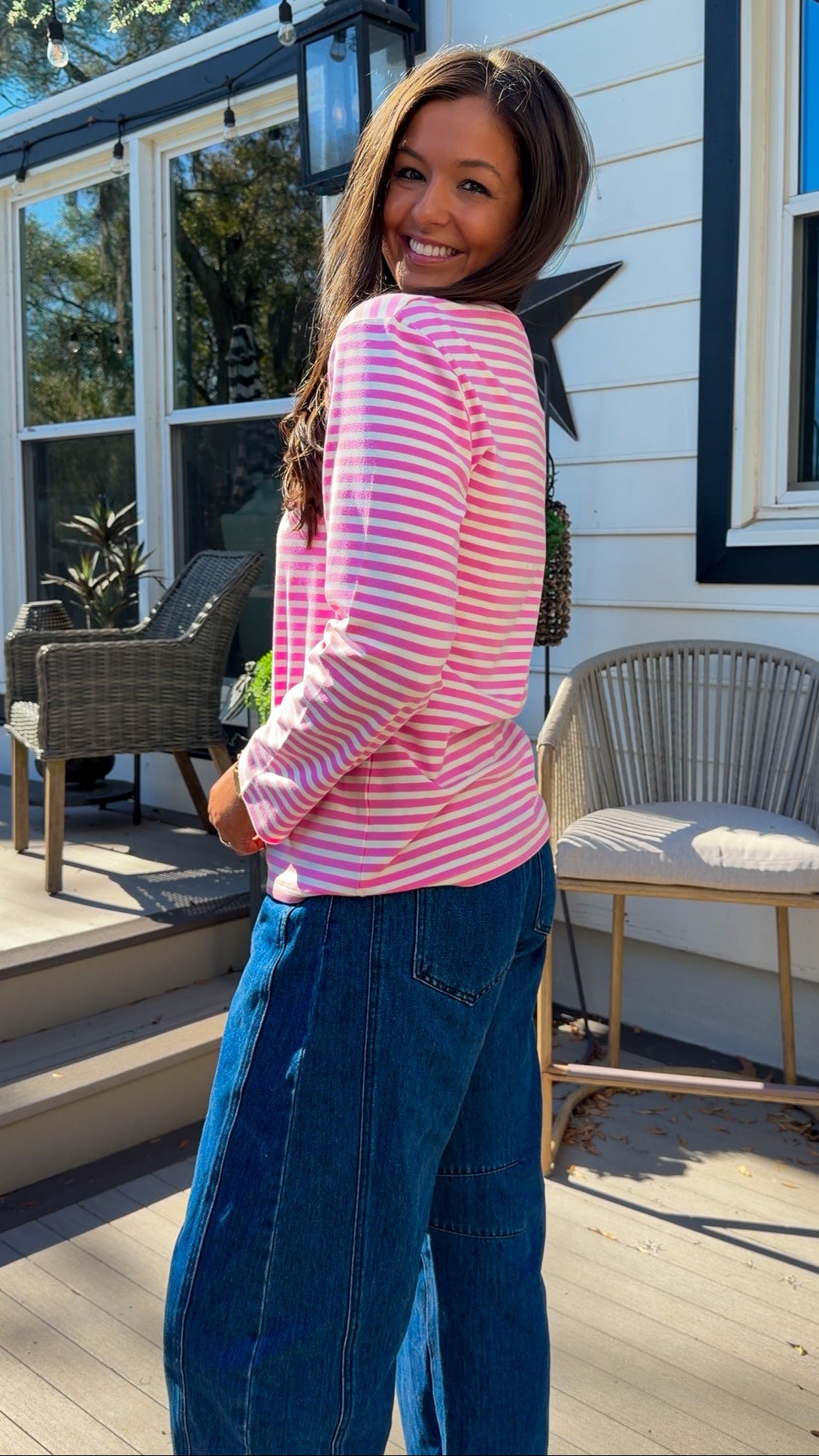 pink and white striped long sleeve knit top with relaxed fit