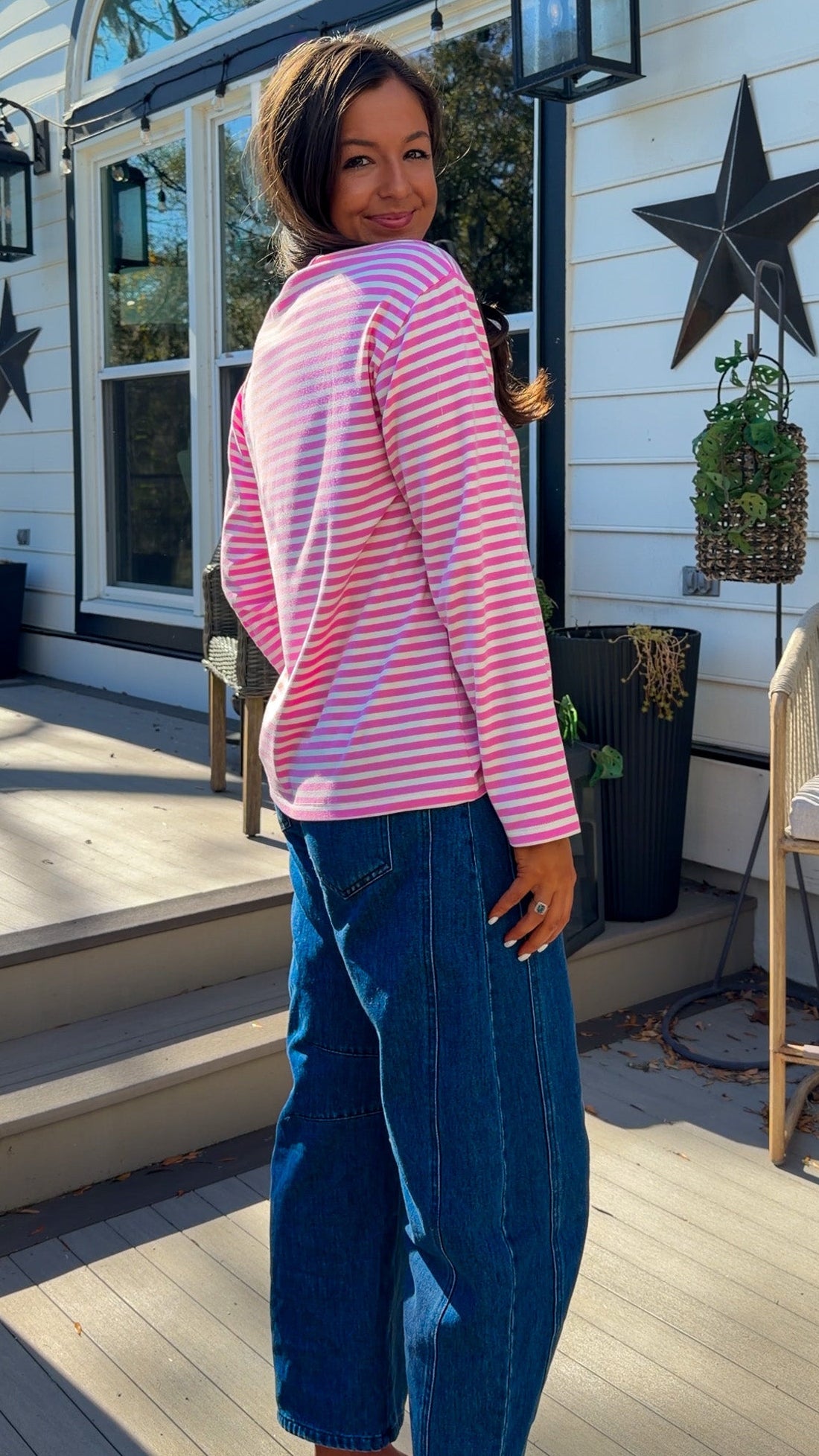 pink and white striped long sleeve knit top with relaxed fit