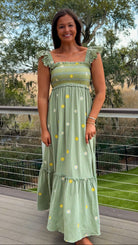 sage green floral embroidered smocked midi dress with ruffle straps and tiered skirt