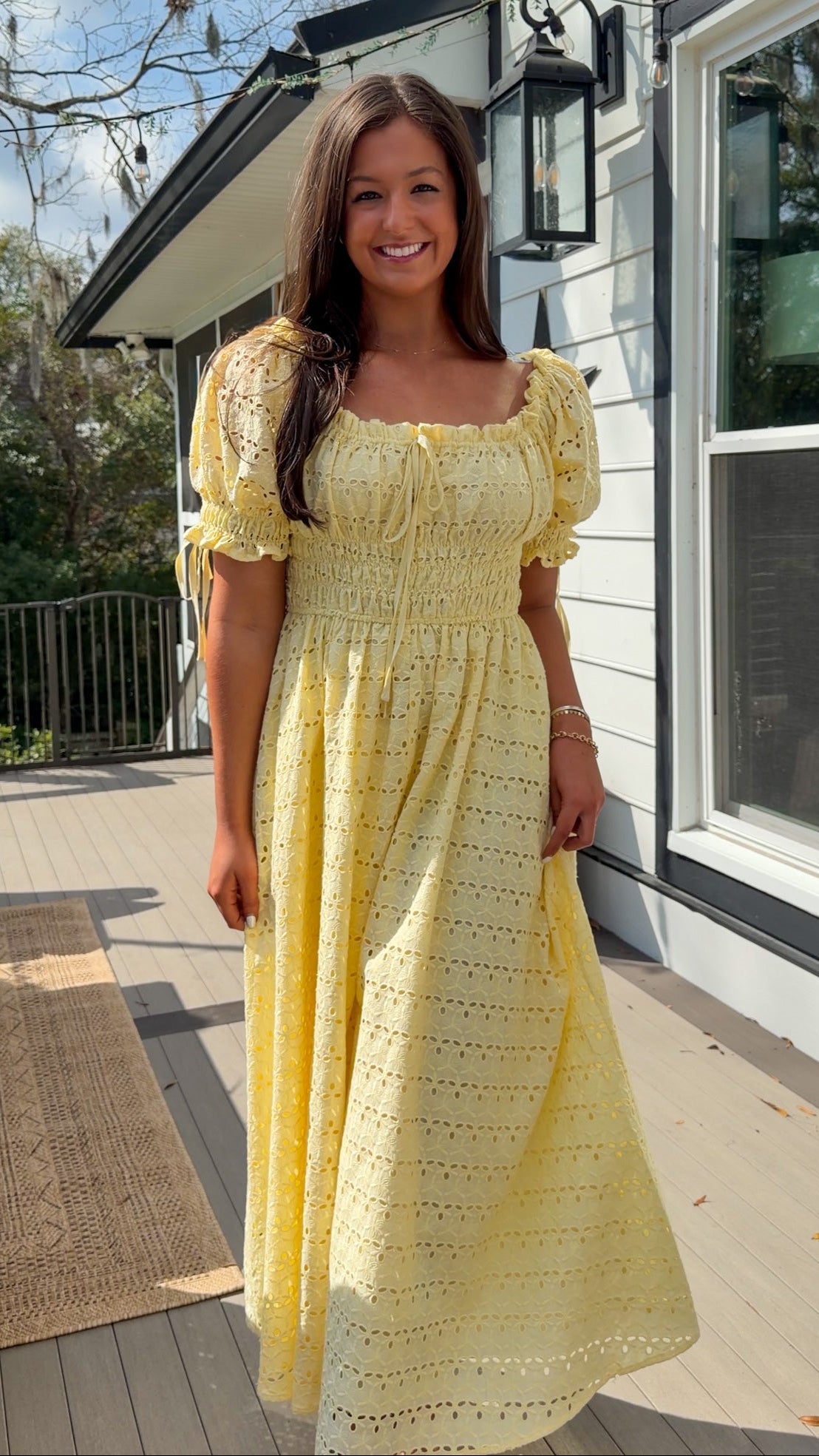 Yellow eyelet lace maxi dress with smocked bodice and puff sleeves