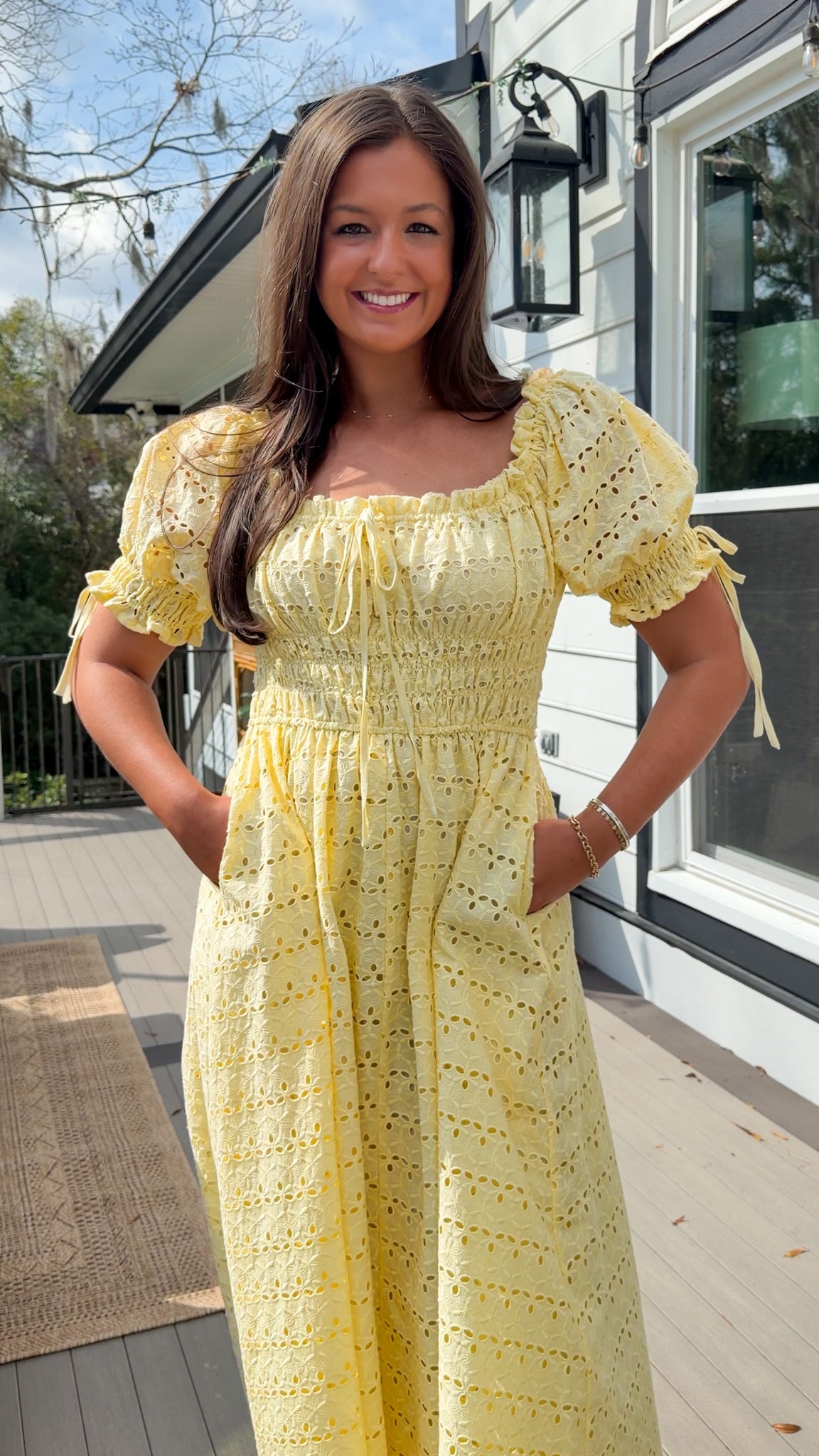 Yellow eyelet lace maxi dress with smocked bodice and puff sleeves