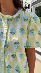 yellow checker floral bubble sleeve tiered mini dress with ruffle front detail