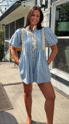 Blue gingham puff sleeve romper with lace trim and ruffle collar
