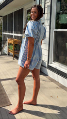 Blue gingham puff sleeve romper with lace trim and ruffle collar