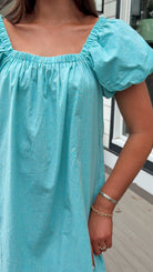 Seafoam gingham puff sleeve midi dress with square neckline and pockets