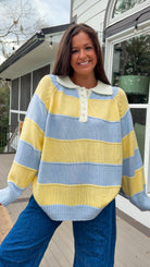 Oversized blue and yellow striped collared knit sweater with button placket