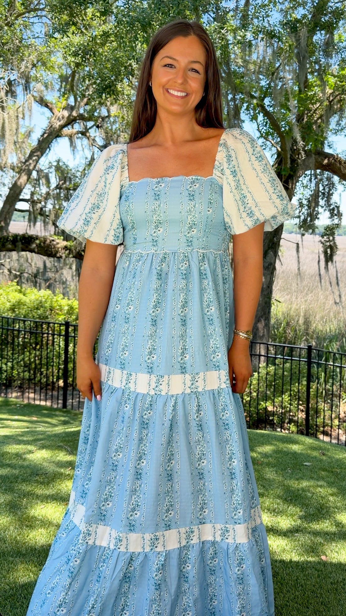 blue and white floral maxi dress with puff sleeves