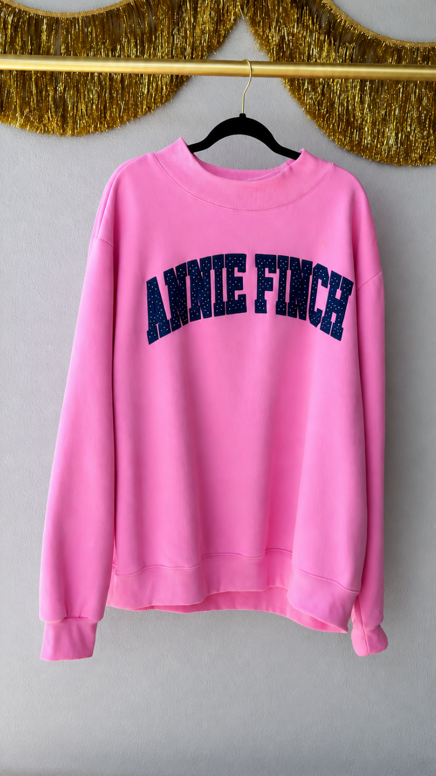 pink mockneck sweatshirt navy and white dot "annie finch" embroidery