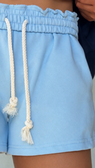 light blue sweatshorts with stretch elastic and drawstring